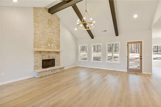 a view of kitchen with cabinets and wooden floor