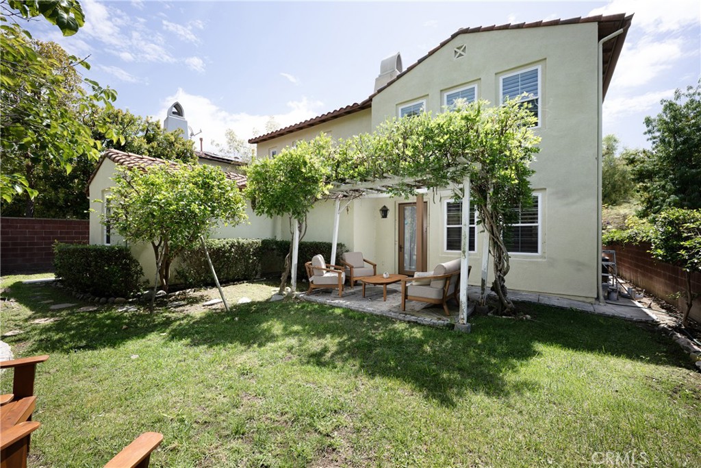 25 Hallcrest Drive Ladera Ranch, CA 92694 - Photo 31 of 40 Beautiful yard with pergola and floral abundance ~