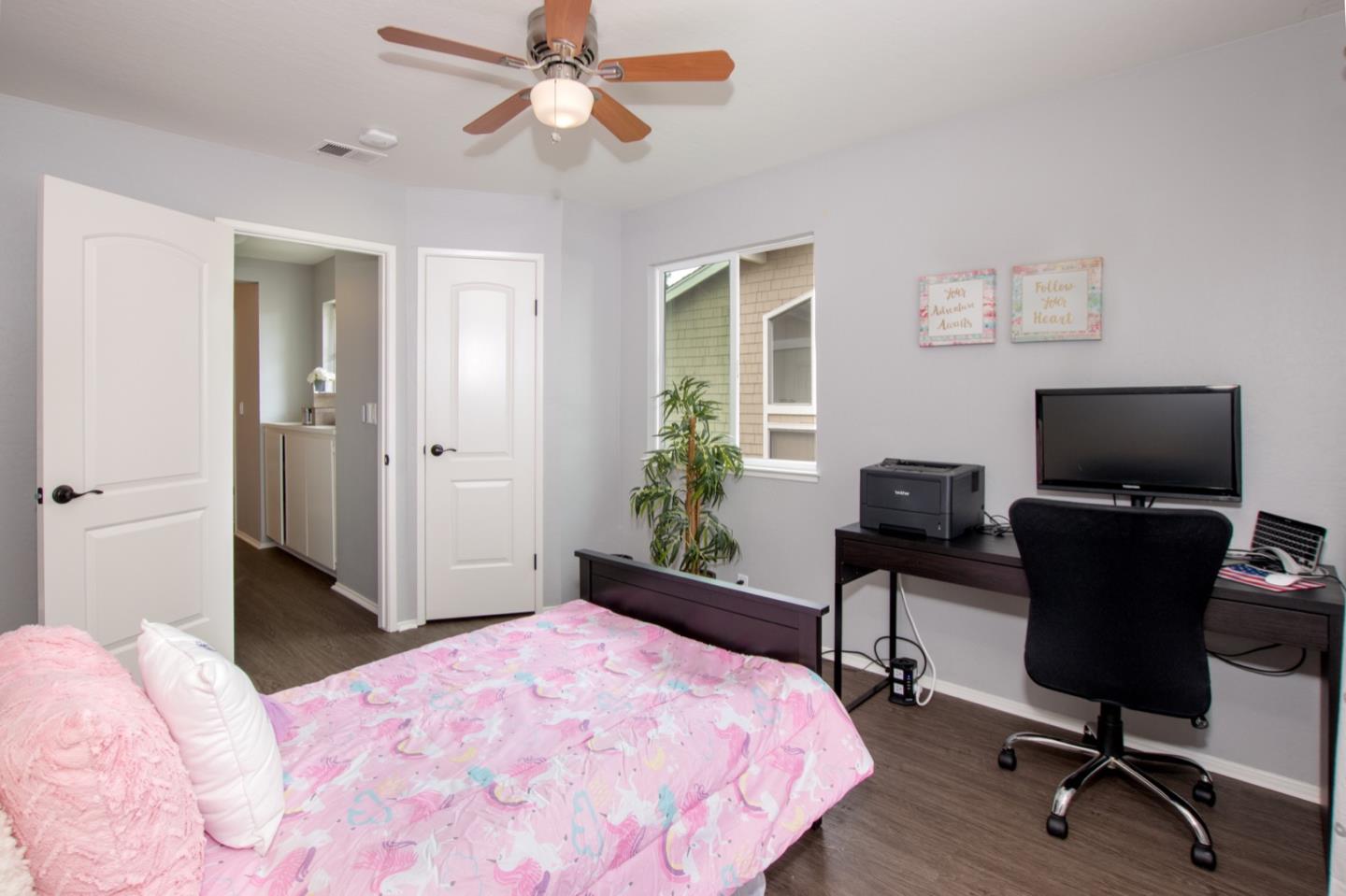 101 Redding Road, Unit C6 Campbell, CA 95008 - Photo 15 of 17 a bedroom with a bed and a flat screen tv