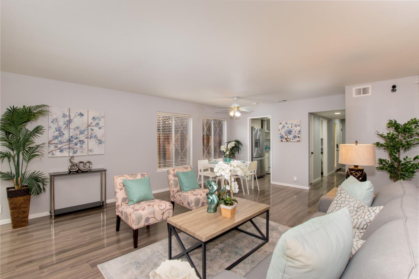 101 Redding Road, Unit C6 Campbell, CA 95008 - Photo 7 of 17 a living room with furniture and wooden floor