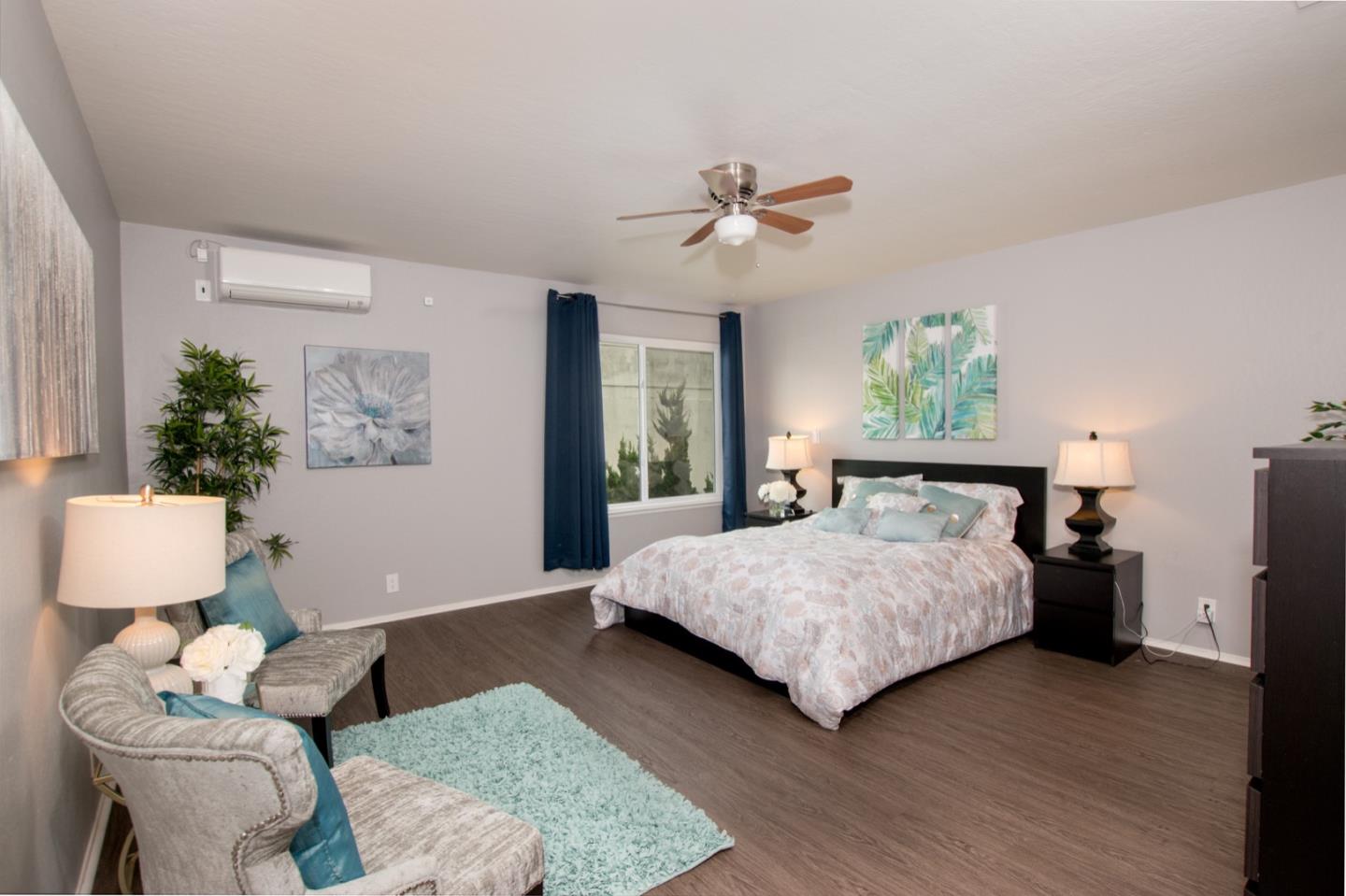 101 Redding Road, Unit C6 Campbell, CA 95008 - Photo 10 of 17 a bedroom with a bed mirror and a window