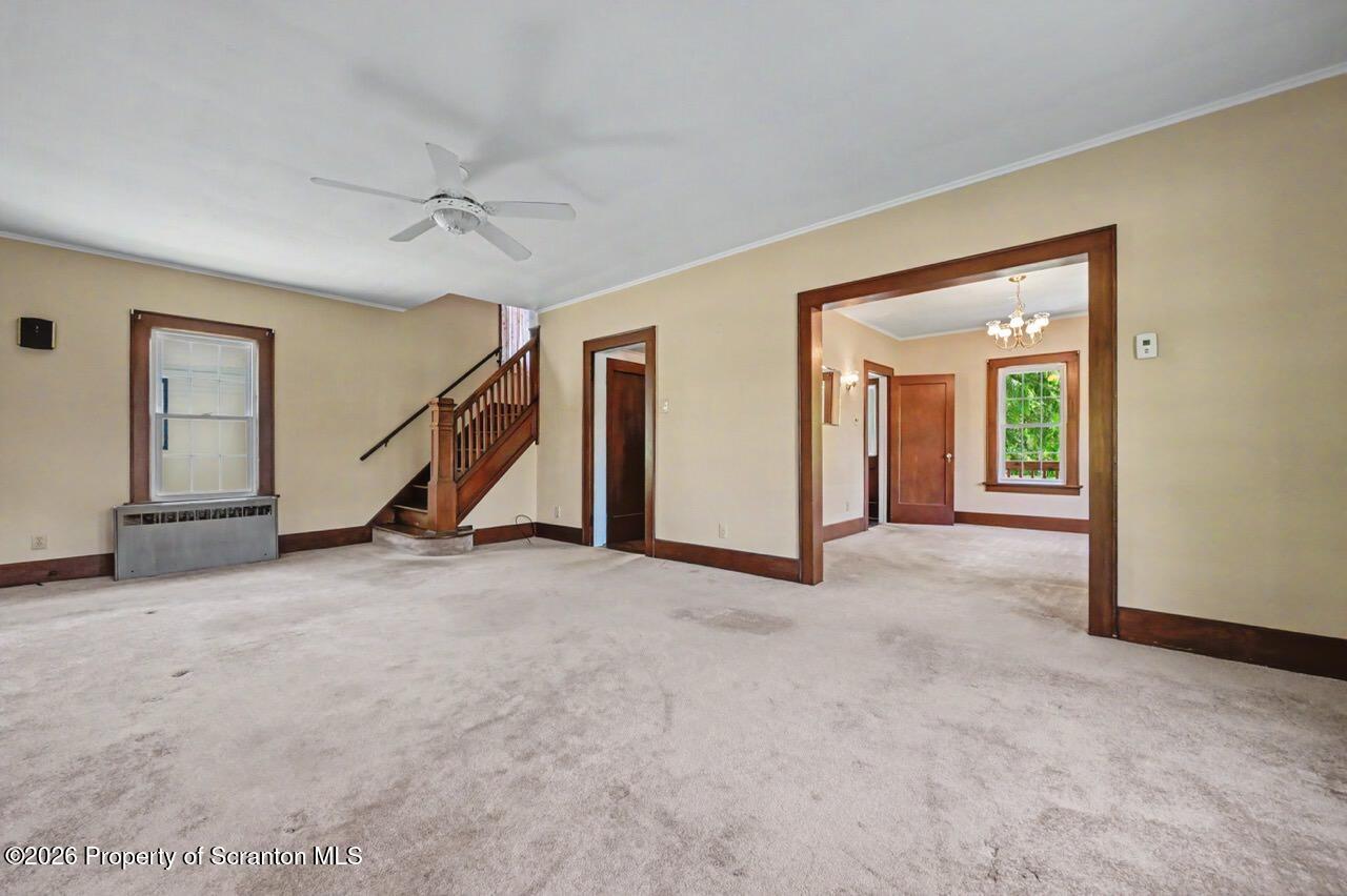 502 Layton Road Clarks Summit, PA 18411 - Photo 11 of 42 a view of an empty room with a fireplace