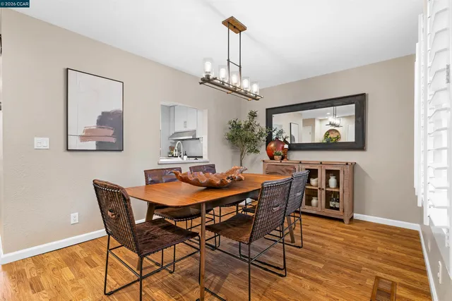 a bathroom with a sink vanity and a mirror