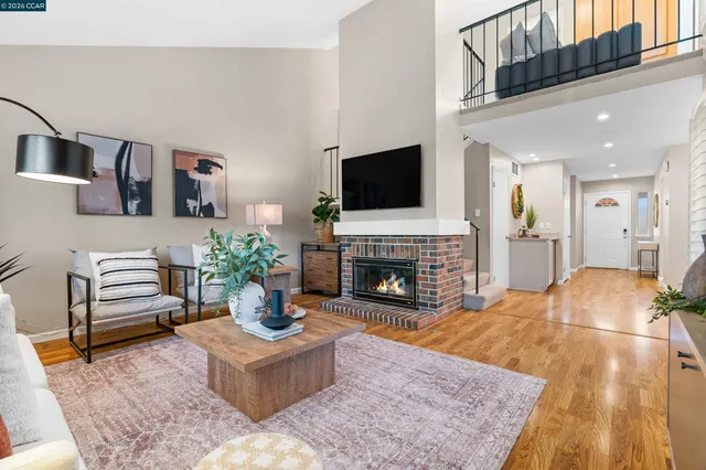 a picture of a bench in front of a wall