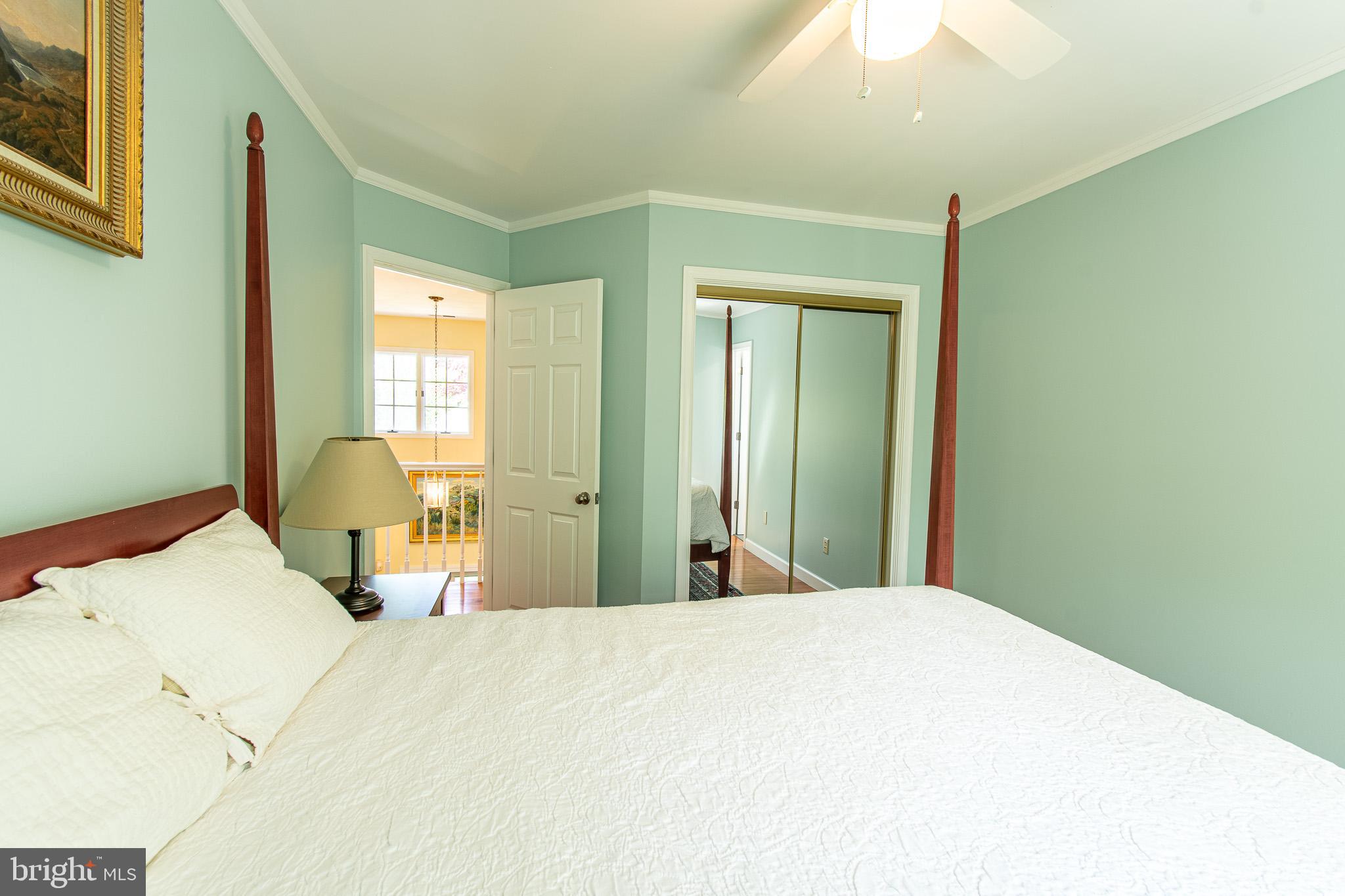 102 Jacks Point Road Oxford, MD 21654 - Photo 39 of 83 a bedroom with a bed and a window