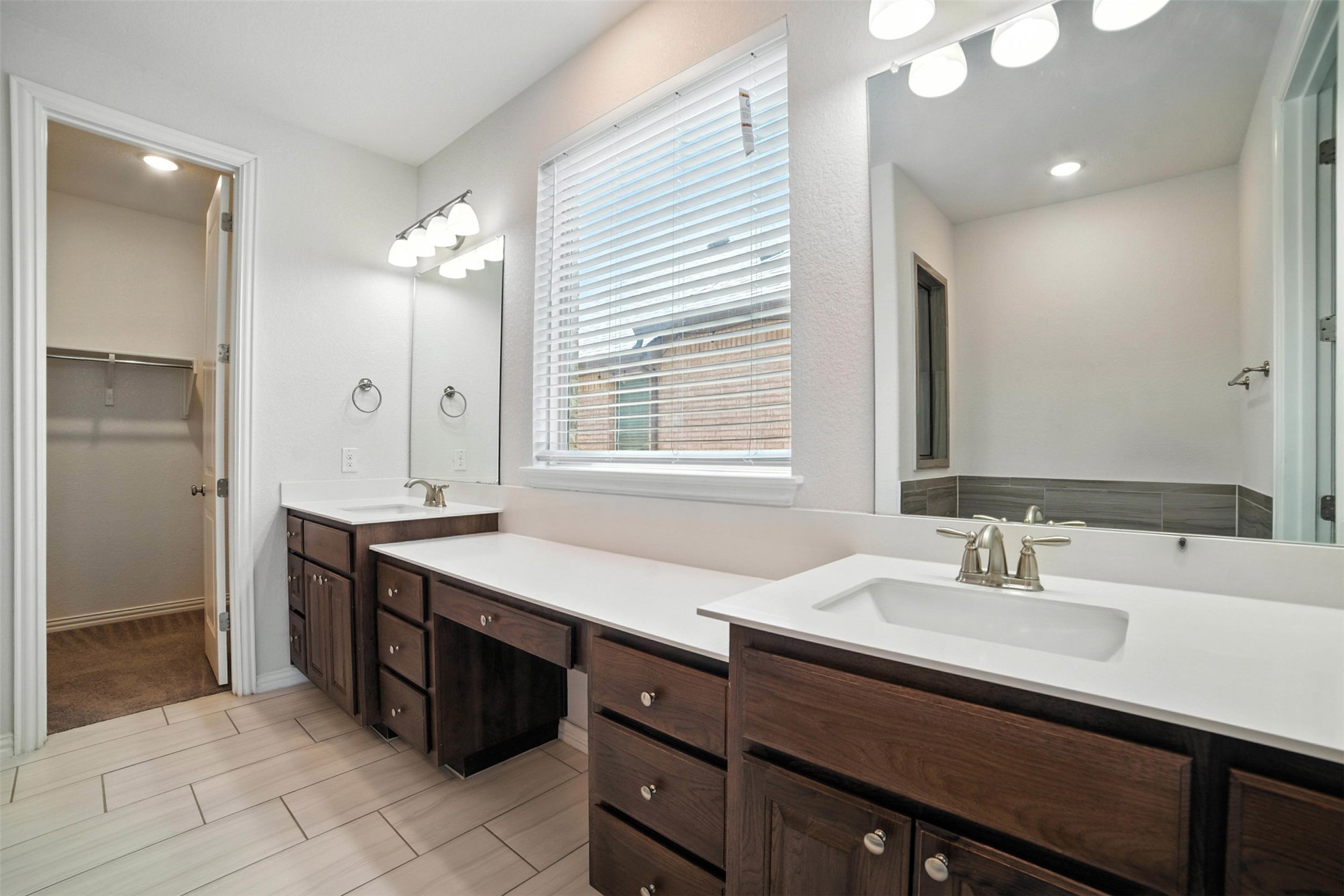 3054 Columbus Loop Round Rock, TX 78665 - Photo 19 of 40 Full bath with vanity, recessed lighting, and a spacious closet
