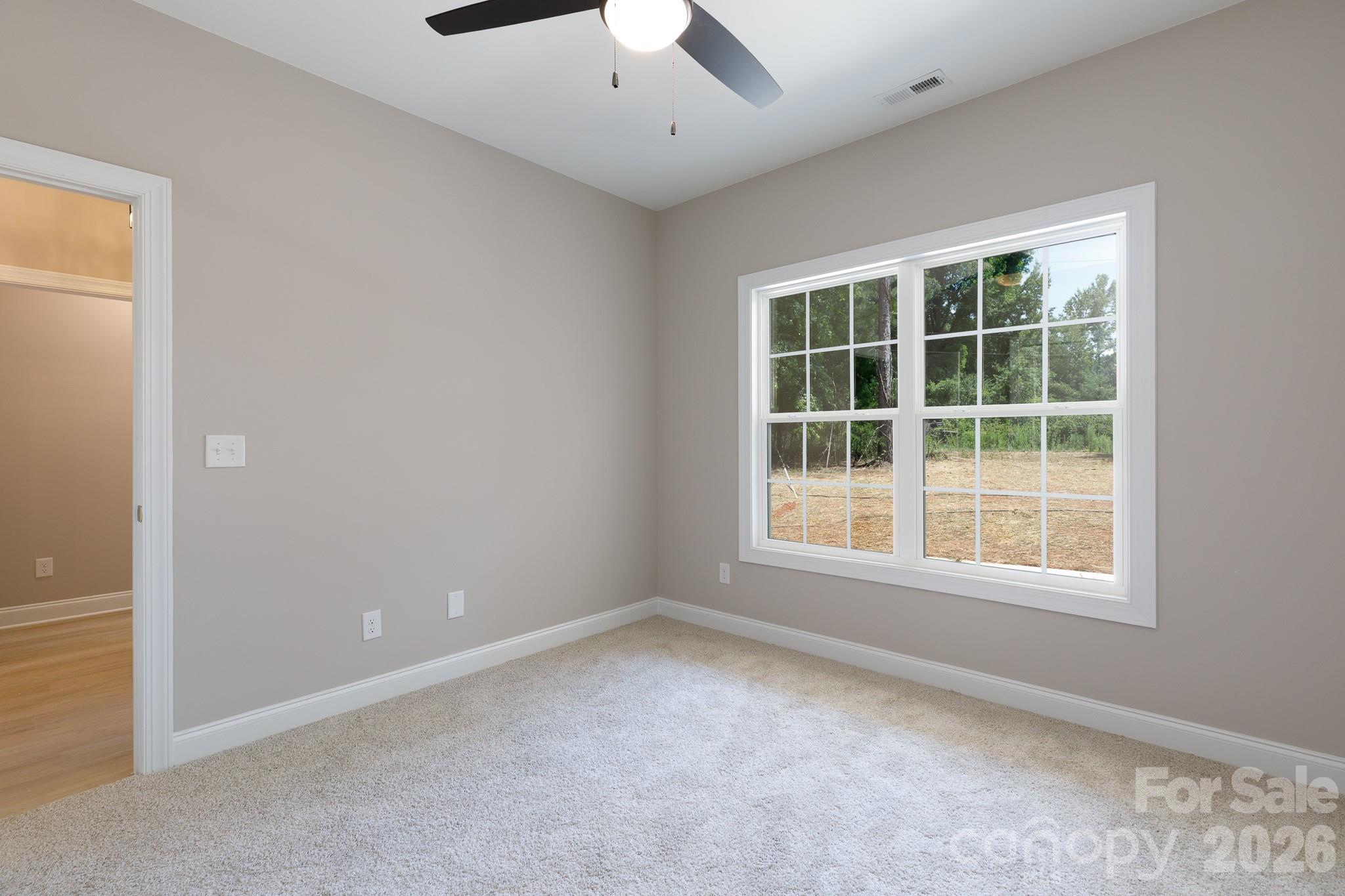 2902 Peden Bridge Road Chester, SC 29706 - Photo 34 of 44 an empty room with a window
