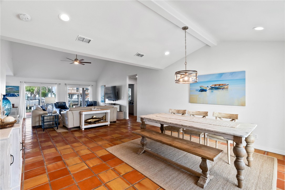 21 Flamingo Road Rockport, TX 78382 - Photo 9 of 30 a living room with furniture a table and kitchen view