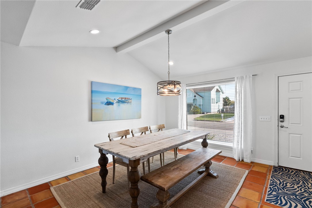 21 Flamingo Road Rockport, TX 78382 - Photo 10 of 30 a living room with a table and a window