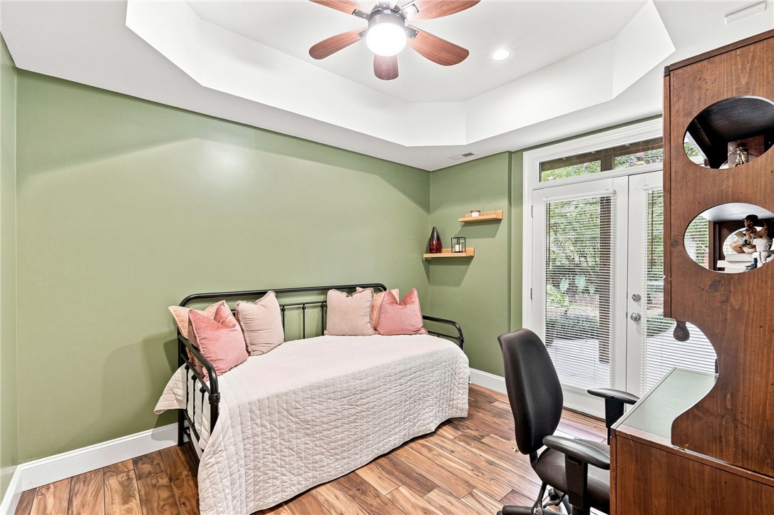 320 Watson Road Easley, SC 29642 - Photo 39 of 50 Gleaming wood floors and a tray ceiling define this versatile space with patio access.