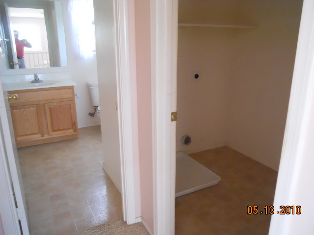 2408 West Maldonado Road Phoenix, AZ 85041 - Photo 10 of 15 upstairs hall bath and laundry room