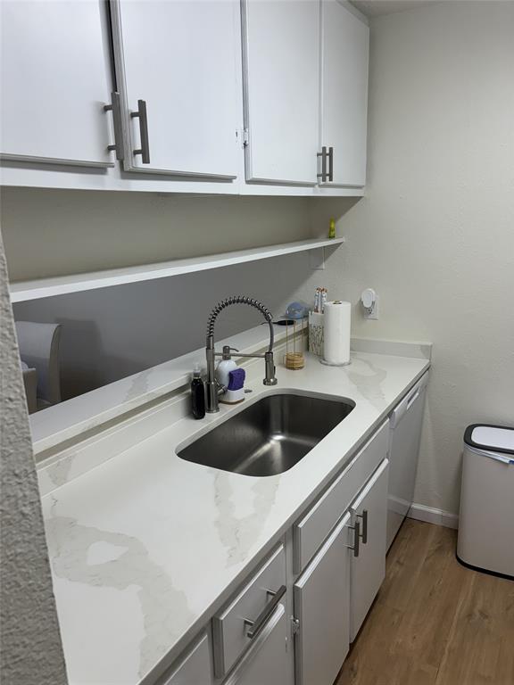 2200 East Trinity Mills Road, Unit 715 Carrollton, TX 75006 - Photo 21 of 31 a close view of sink and tap