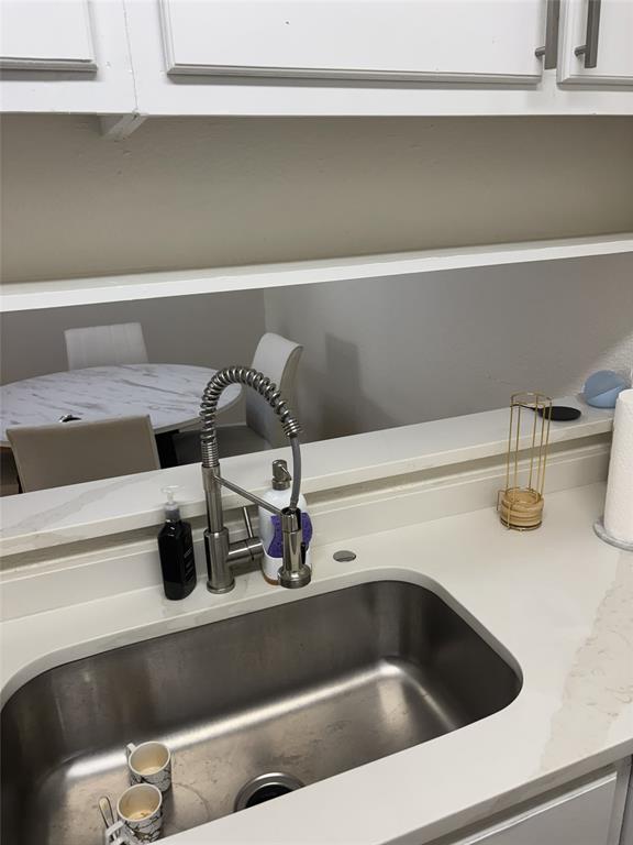 2200 East Trinity Mills Road, Unit 715 Carrollton, TX 75006 - Photo 24 of 31 a close view of sink