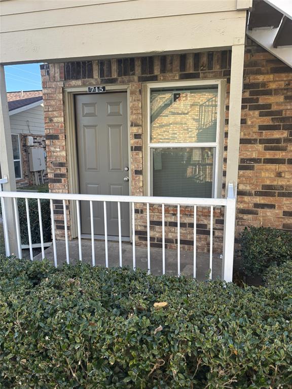 2200 East Trinity Mills Road, Unit 715 Carrollton, TX 75006 - Photo 26 of 31 a view of a house with a large window