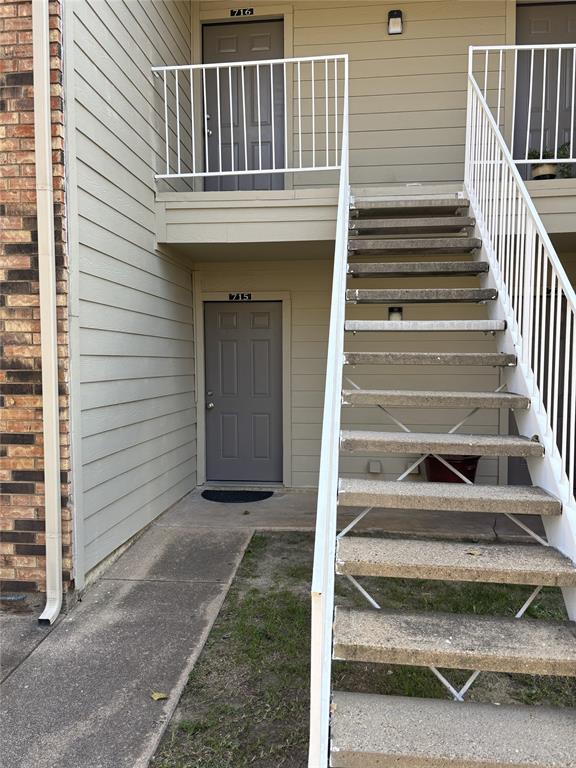 2200 East Trinity Mills Road, Unit 715 Carrollton, TX 75006 - Photo 6 of 31 a view of entryway with wooden floor