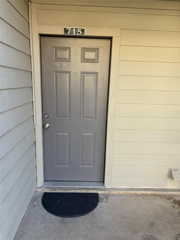 2200 East Trinity Mills Road, Unit 715 Carrollton, TX 75006 - Photo 8 of 31 a view of front door