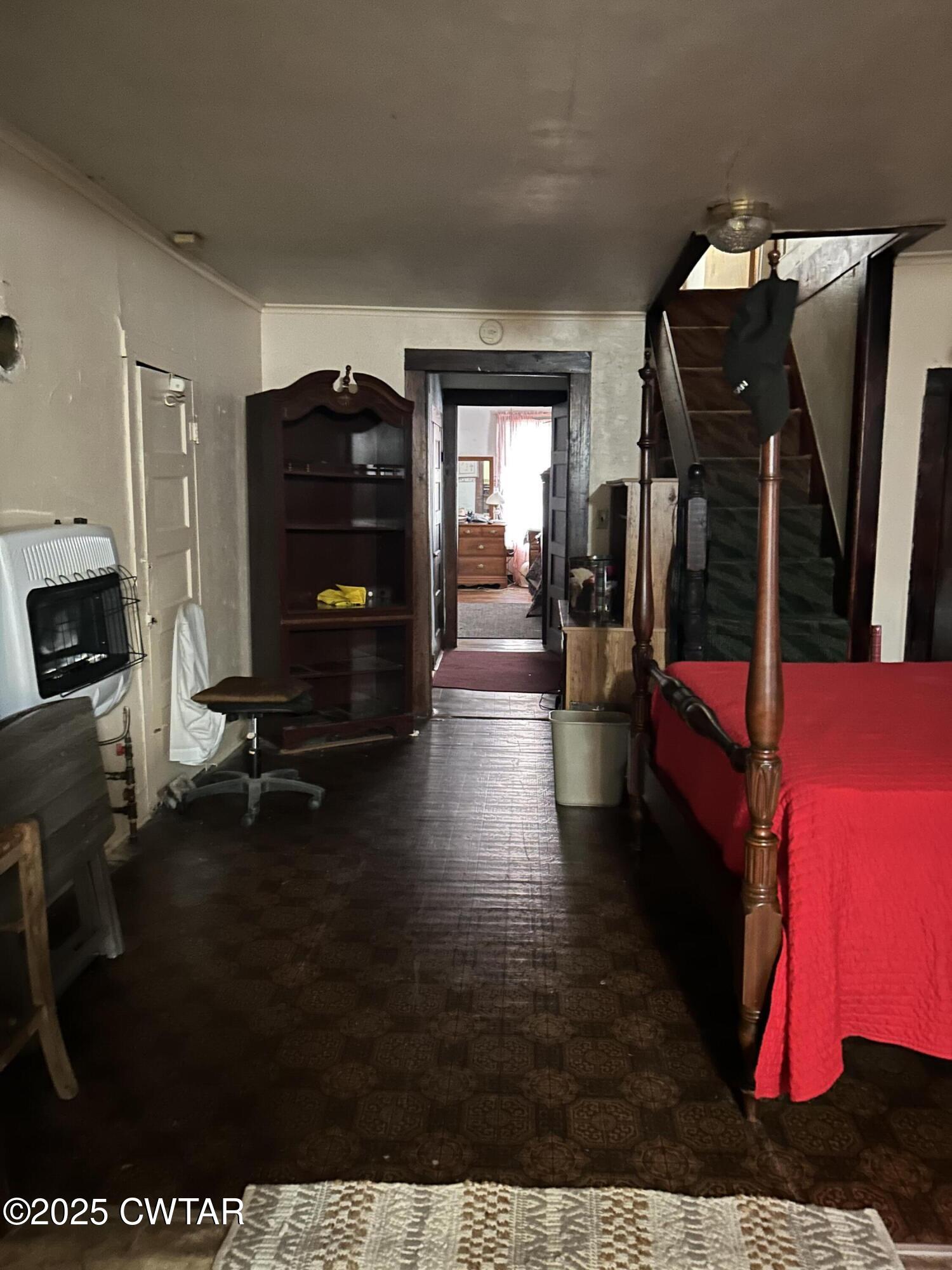 3084 West Jackson Street Milan, TN 38358 - Photo 5 of 11 a living room with furniture and a flat screen tv