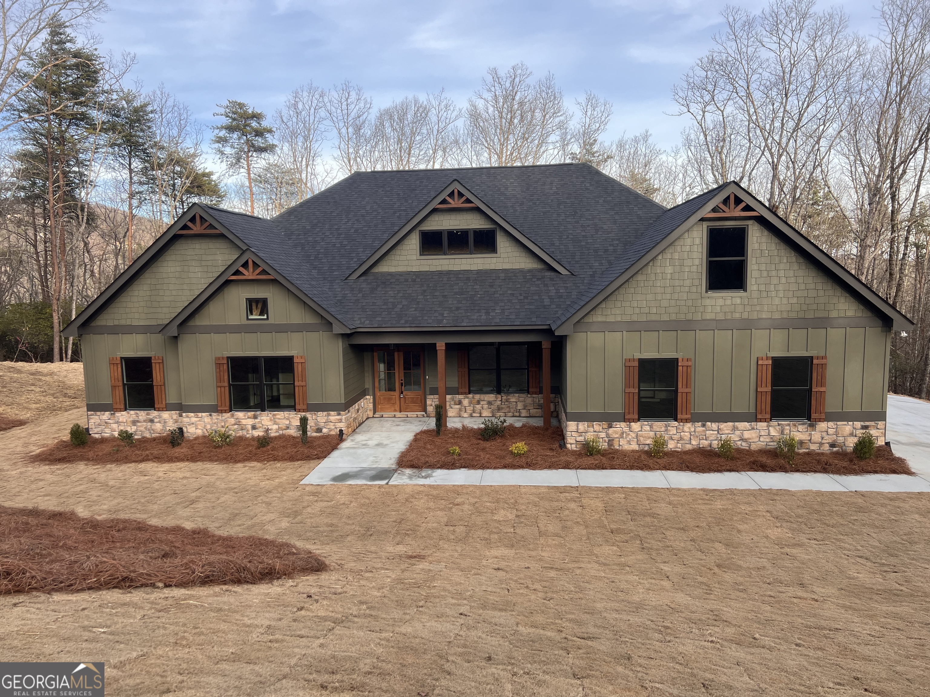 172 Pinecrest Road Clarkesville, GA 30523 - Photo 1 of 1 a front view of a house with a yard