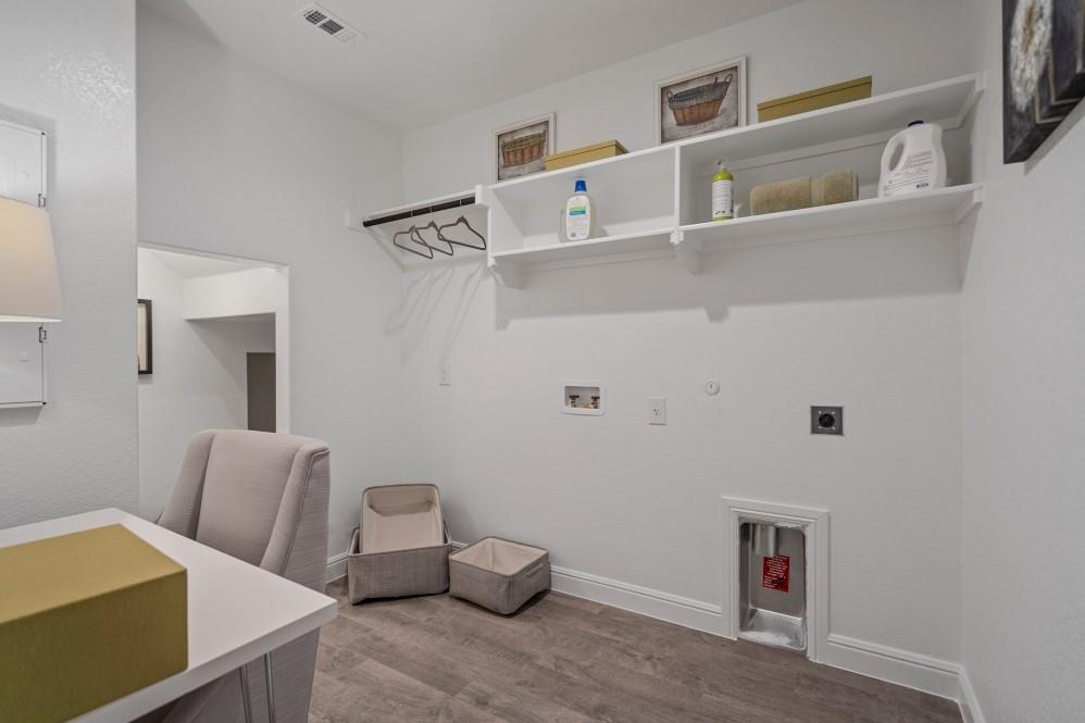 130 Hugo Court Rhome, TX 76078 - Photo 25 of 40 a room with furniture and a table