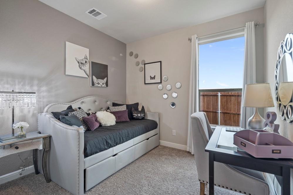 130 Hugo Court Rhome, TX 76078 - Photo 26 of 40 a living room with furniture and window
