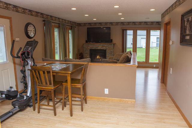 18026 Malvern Road Morrison, IL 61270 - Photo 22 of 37 a view of a livingroom with furniture and a ceiling fan