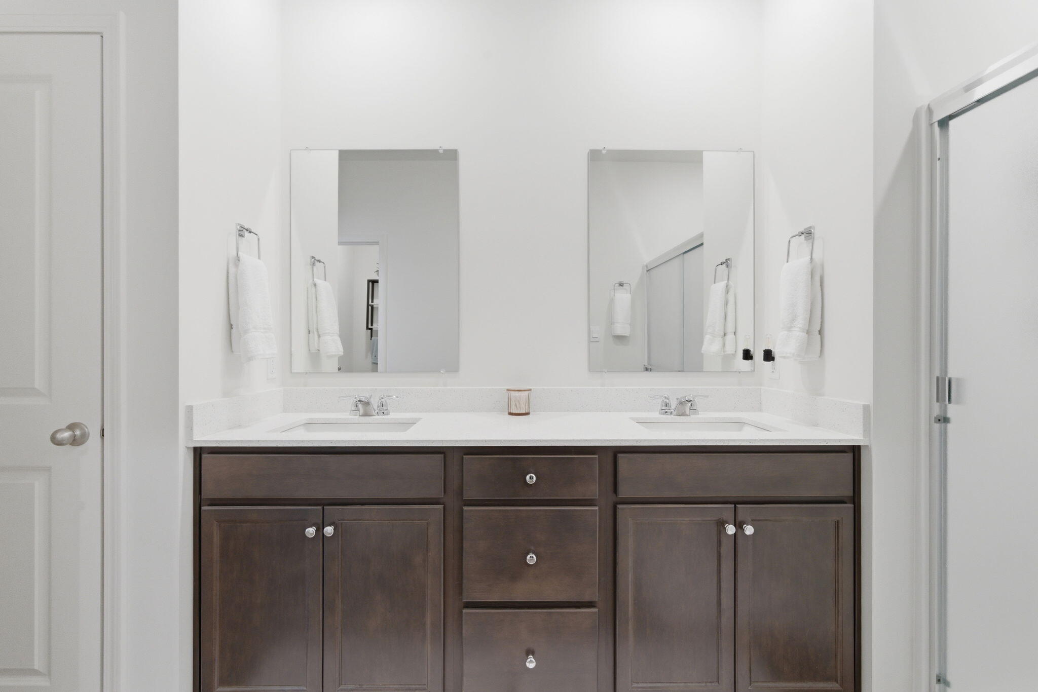 10617 Whitney Place Crown Point, IN 46307 - Photo 12 of 26 a bathroom with double sink and a mirror