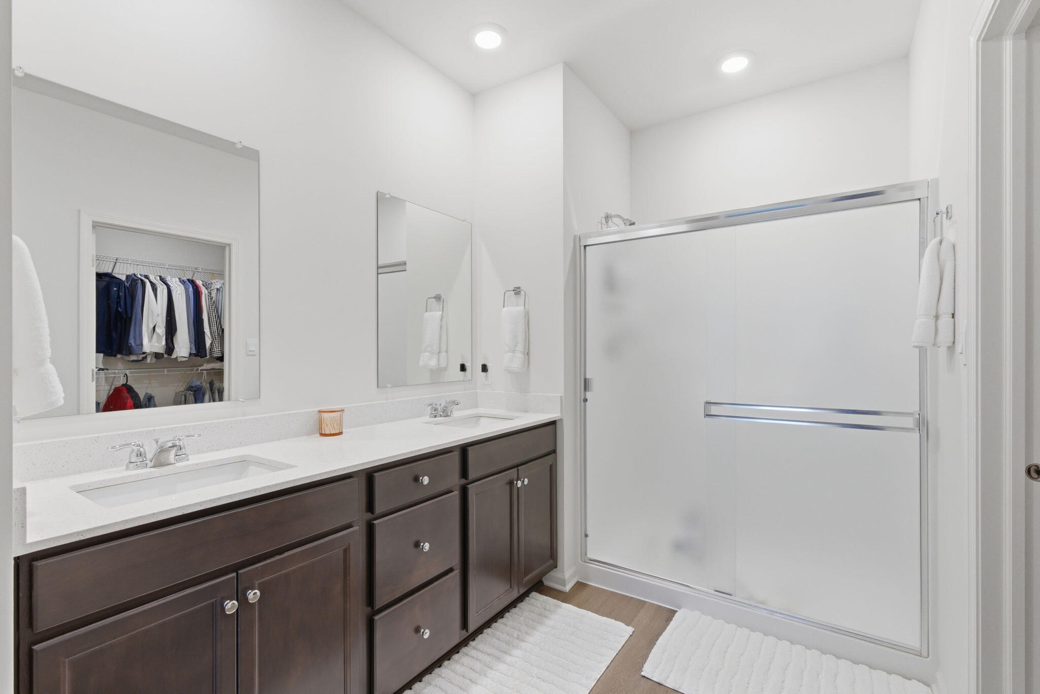 10617 Whitney Place Crown Point, IN 46307 - Photo 13 of 26 a bathroom with a double vanity sink mirror and double