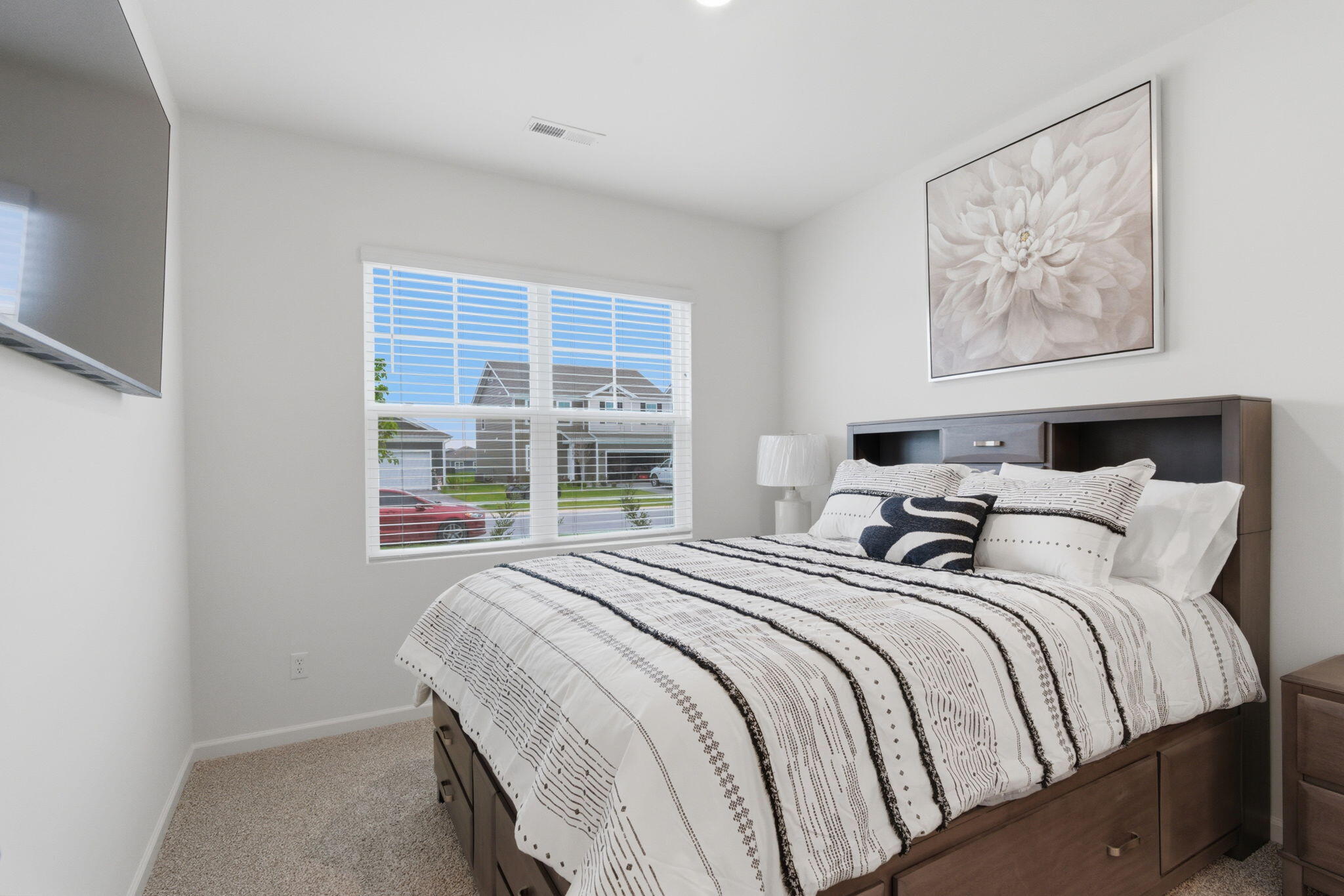 10617 Whitney Place Crown Point, IN 46307 - Photo 15 of 26 a bedroom with bed and a window