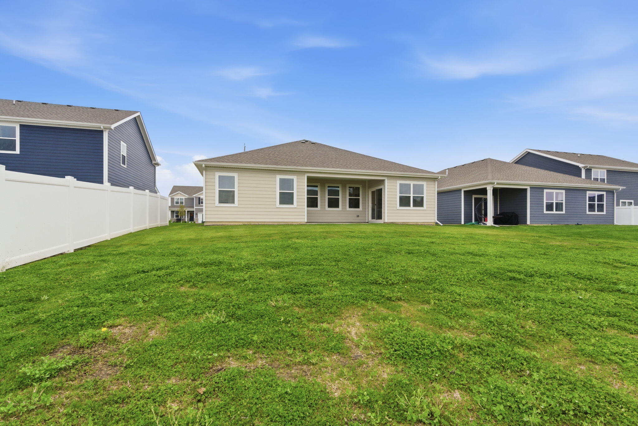 10617 Whitney Place Crown Point, IN 46307 - Photo 21 of 26 a front view of a house with a garden