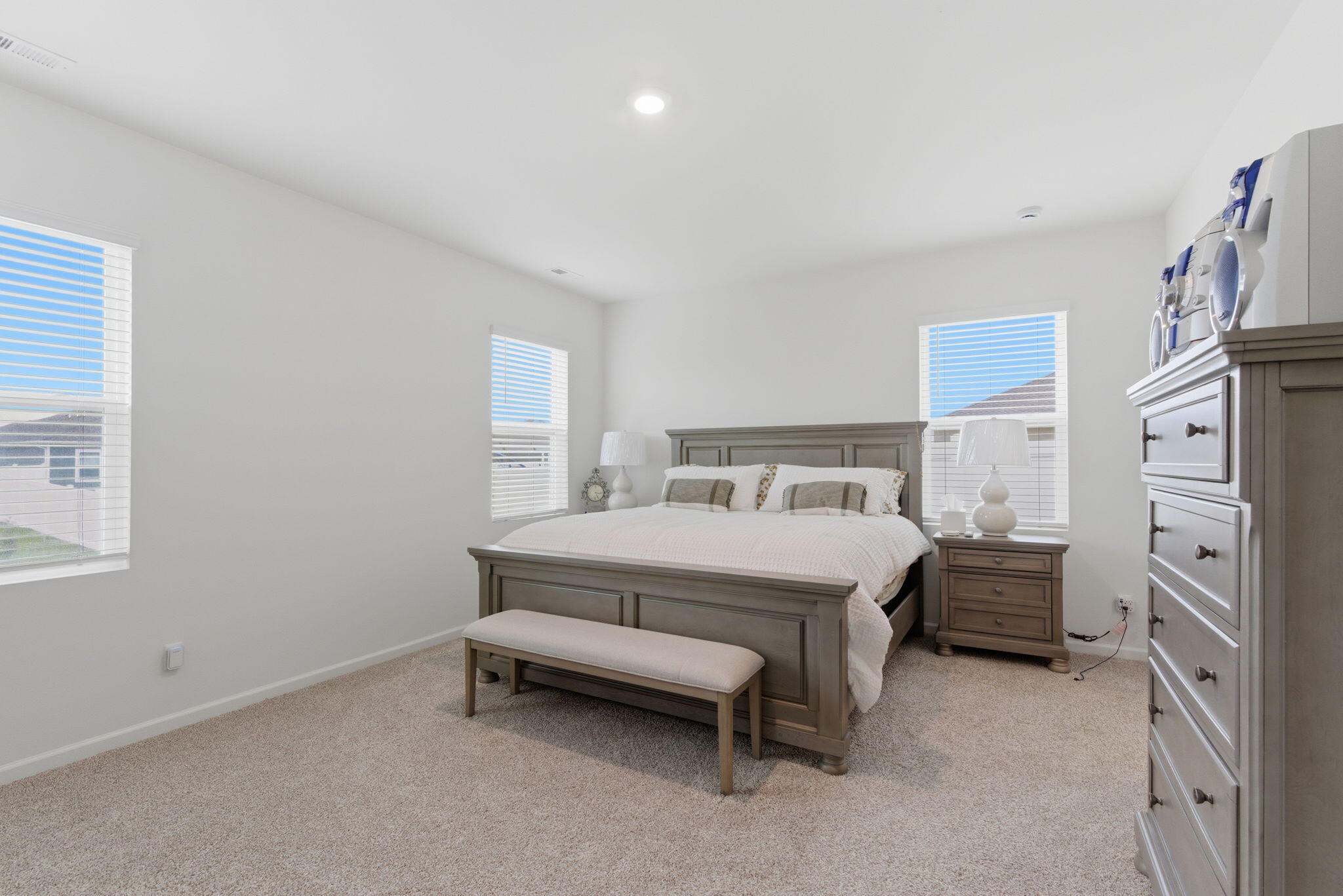 10617 Whitney Place Crown Point, IN 46307 - Photo 9 of 26 a bedroom with a bed and a cabinets