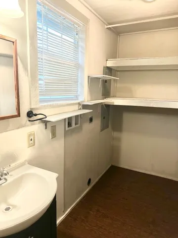 a bathroom with a sink and a bathtub
