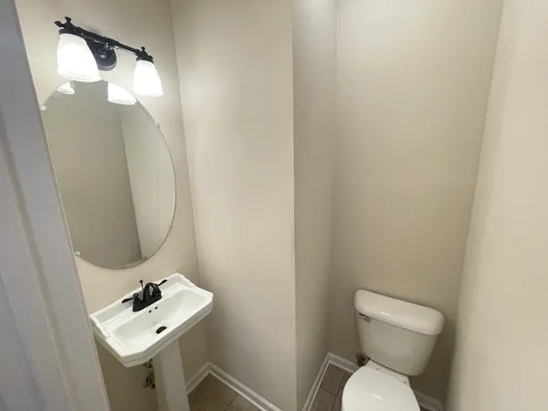 a kitchen with stainless steel appliances a refrigerator sink and microwave