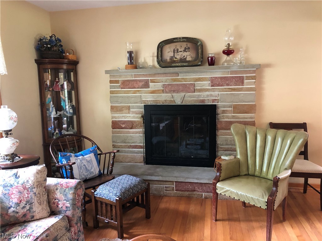 1934 Conwill Road Stow, OH 44224 - Photo 3 of 32 Living room fireplace can be gas or woodburning. Beautiful oak floor has been refinished.
