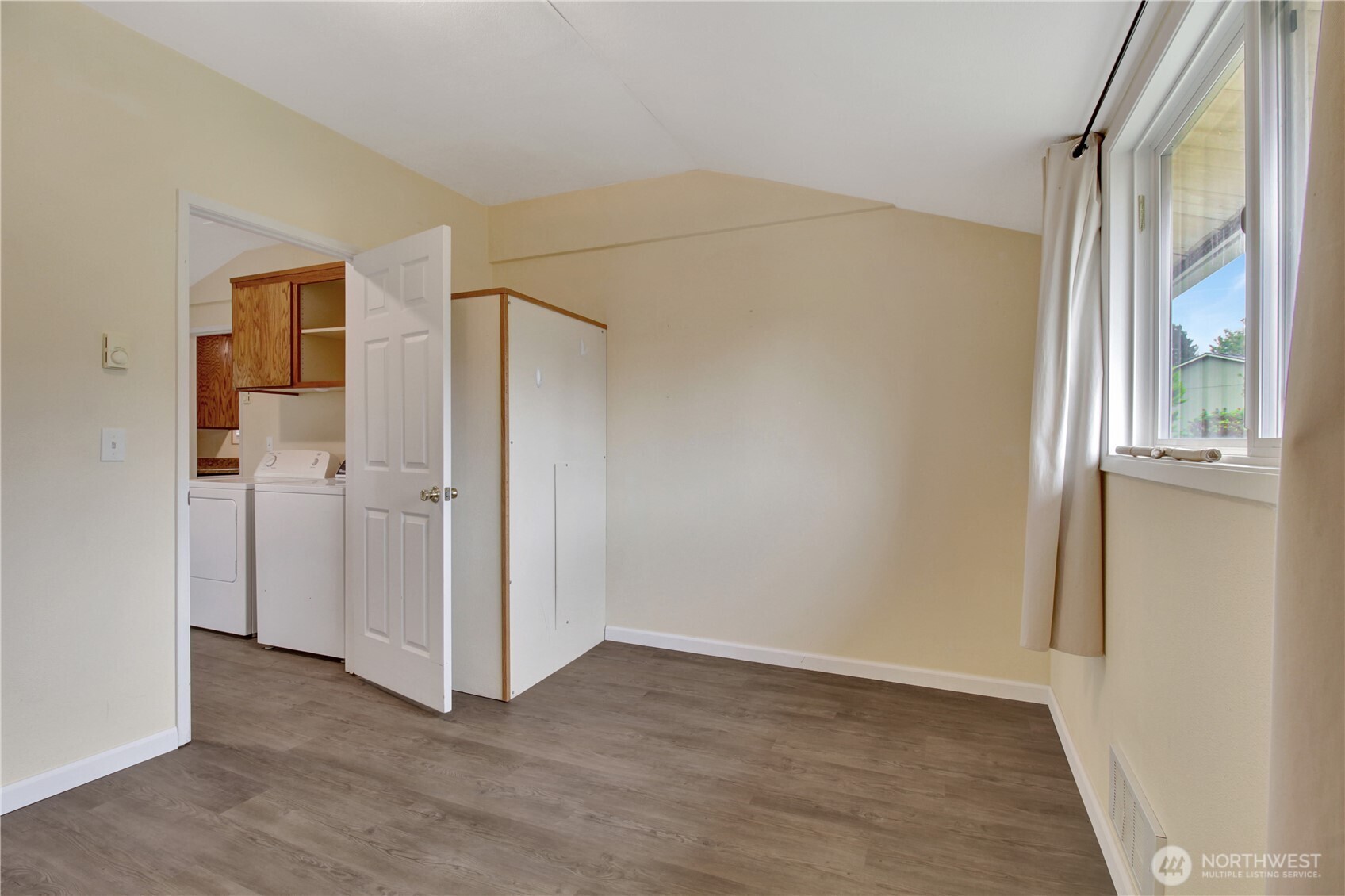 40018 May Creek Road Gold Bar, WA 98251 - Photo 13 of 25 a view of an empty room with a window