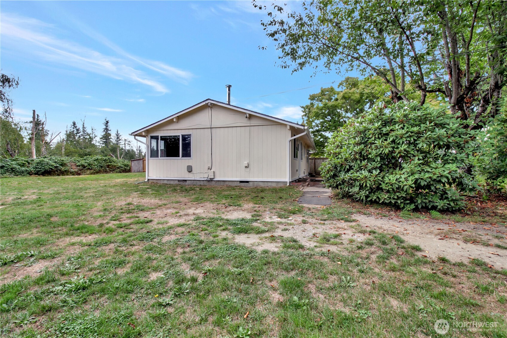 40018 May Creek Road Gold Bar, WA 98251 - Photo 21 of 25 a big house with a big yard and large trees