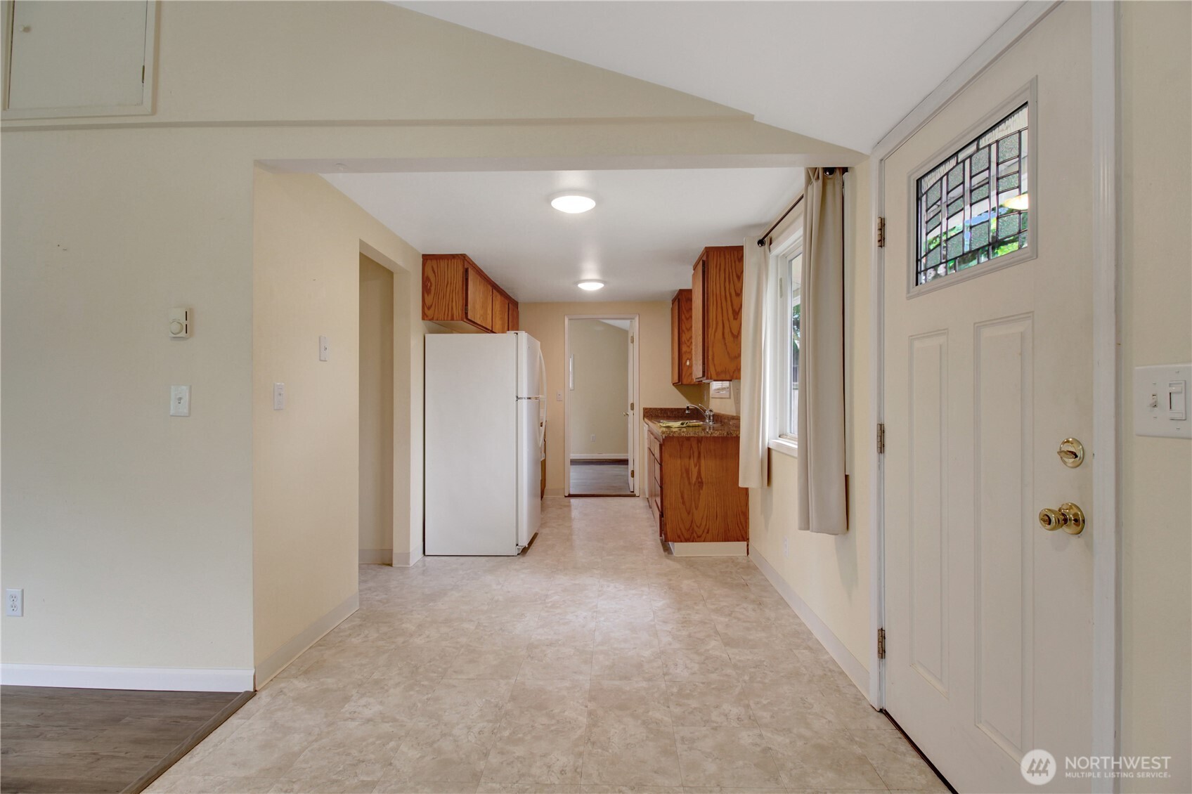40018 May Creek Road Gold Bar, WA 98251 - Photo 6 of 25 a view of a hallway with a kitchen