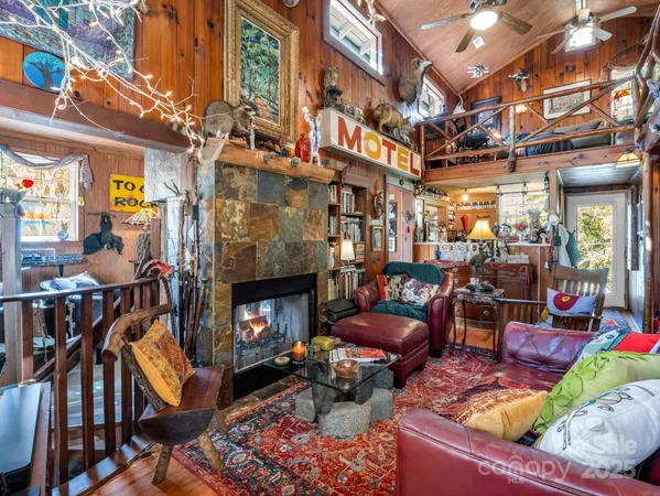 a view of a chairs and cars in a street