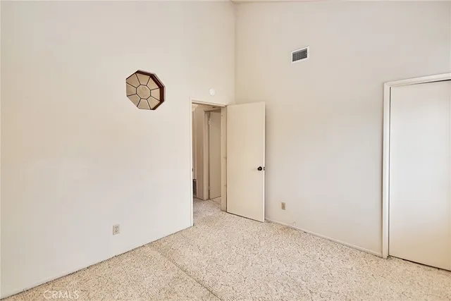 a view of a hallway with a window