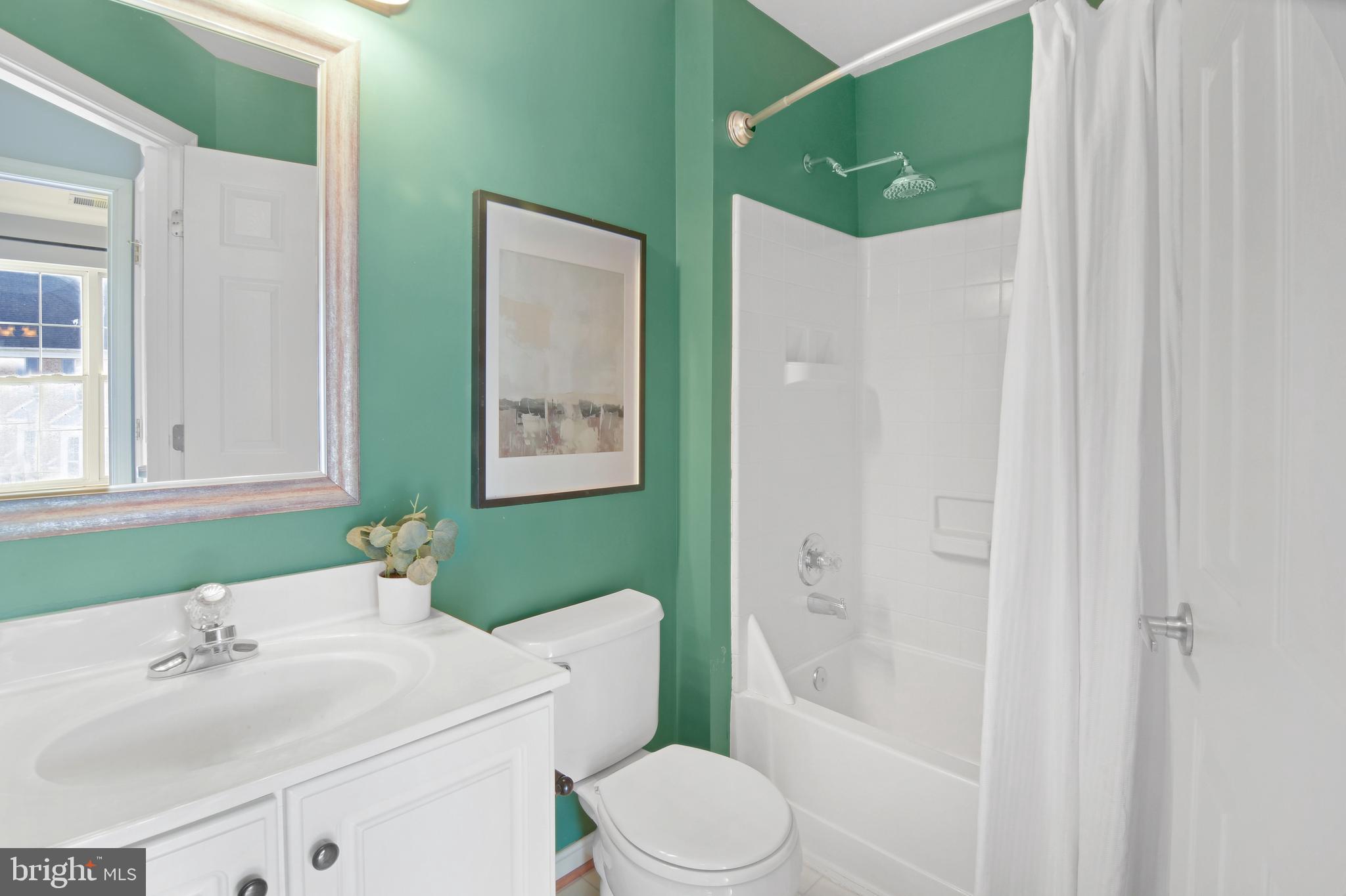 2020 Puritan Terrace Annapolis, MD 21401 - Photo 22 of 33 a bathroom with a sink toilet and shower