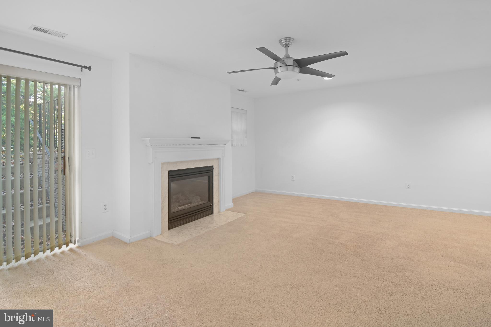 2020 Puritan Terrace Annapolis, MD 21401 - Photo 27 of 33 en empty room with ceiling fan and window