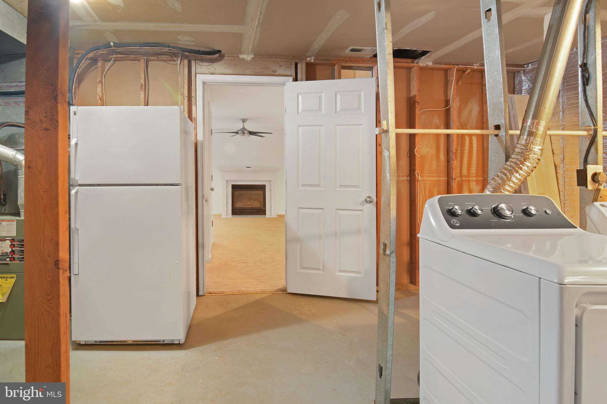 2020 Puritan Terrace Annapolis, MD 21401 - Photo 31 of 33 a white refrigerator freezer and a stove sitting inside of a kitchen