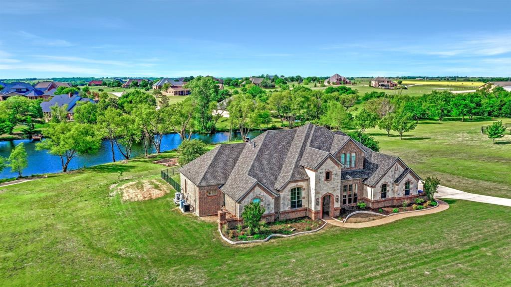 4700 Lake Drive Celina, TX 75009 - Photo 1 of 1 an aerial view of a house with porch and a yard