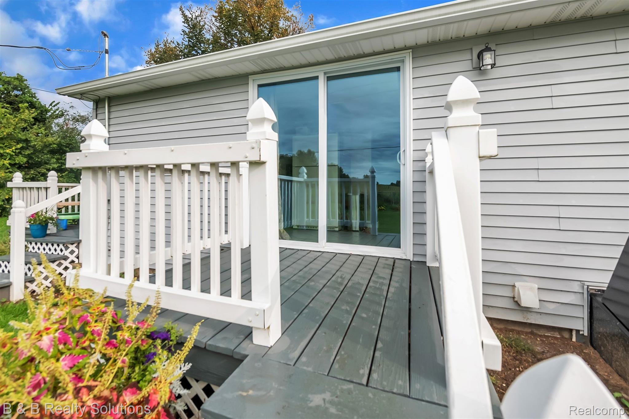 1115 Angle Road Lapeer, MI 48446 - Photo 33 of 39 34-1115 Angle Rd-WindowStill-Real-E.jpg