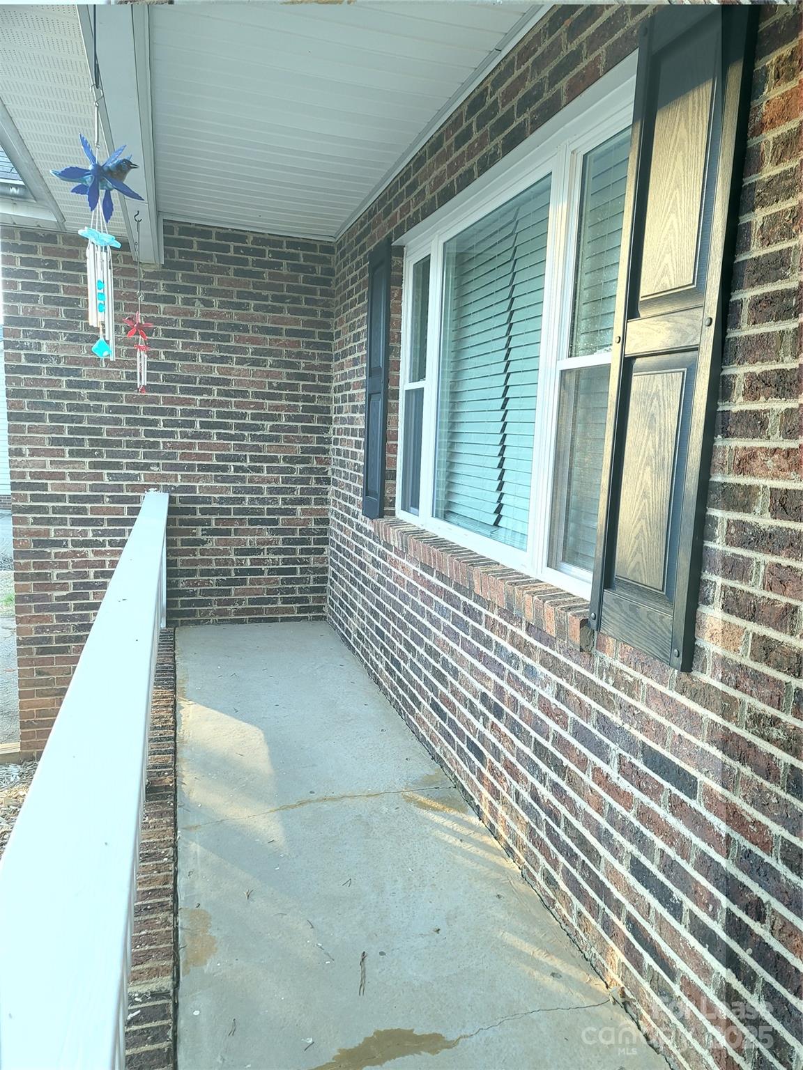 7505 Sarah Drive Denver, NC 28037 - Photo 2 of 13 a view of a balcony with door