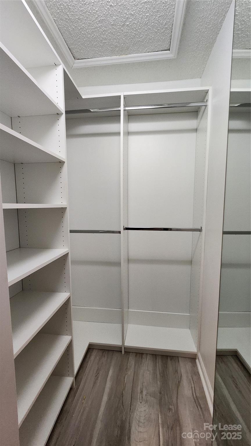 7505 Sarah Drive Denver, NC 28037 - Photo 7 of 13 a view of an empty walk in closet