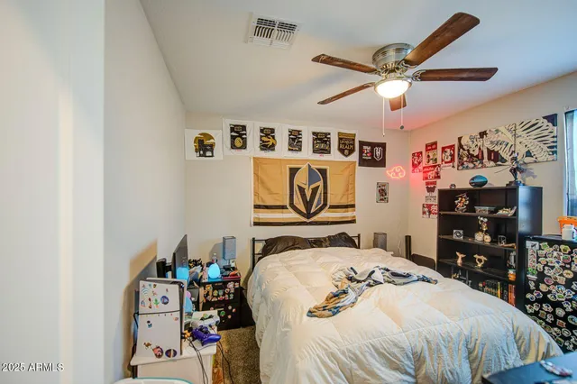 a bedroom with a bed and a walk in closet