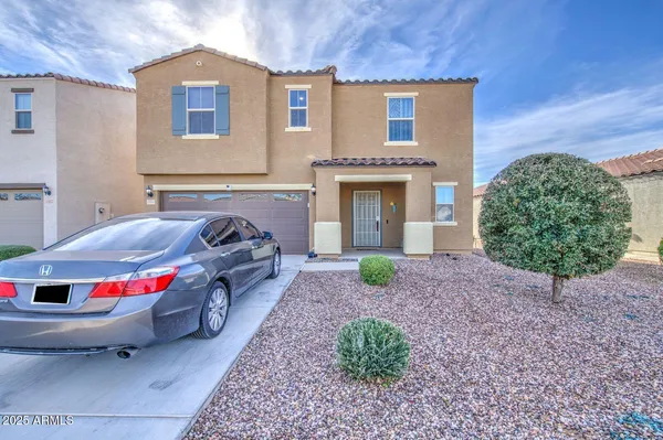 a car parked in front of a house