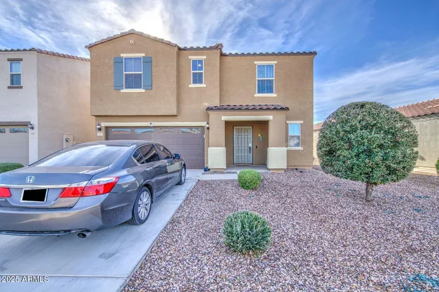 a car parked in front of a house