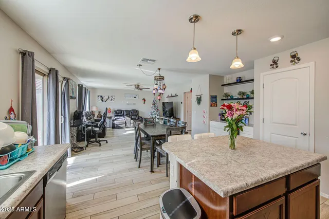 a view of a kitchen and dining room