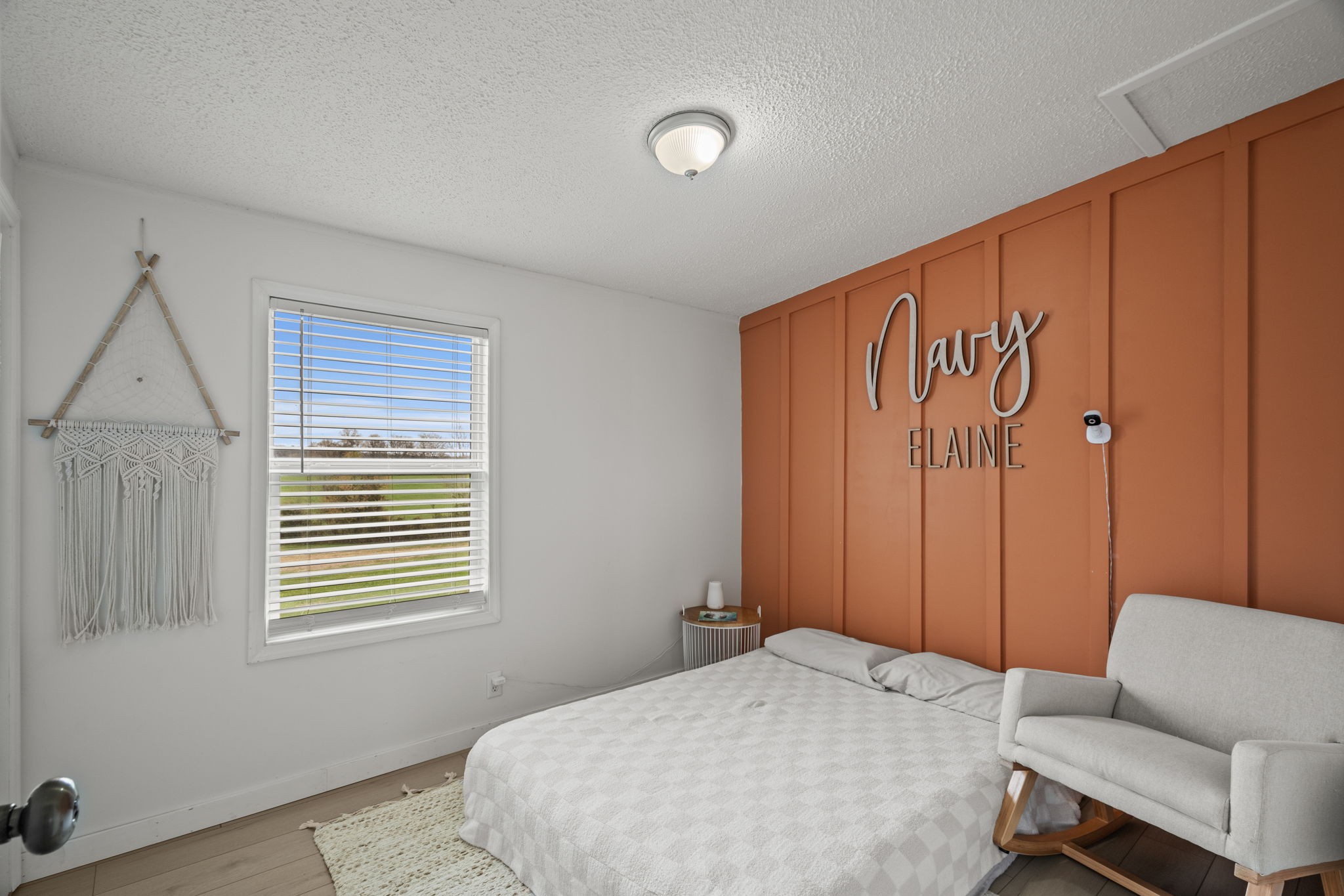 1848 Mint Springs Road Adams, TN 37010 - Photo 20 of 36 a bedroom with a bed and a chair